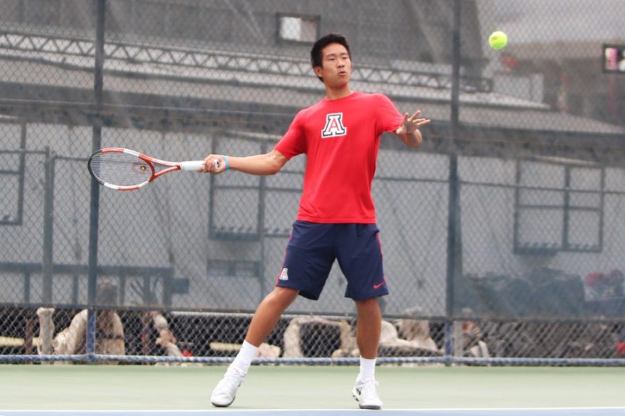 Arizona mens tennis player Jason Jaruvang sets up to hit a forehand during Arizonas 4-0 loss to Washington at the LaNelle Robson Tennis Center on Sunday. Jaruvang and the Wildcats struggled over the weekend en route to a loss.