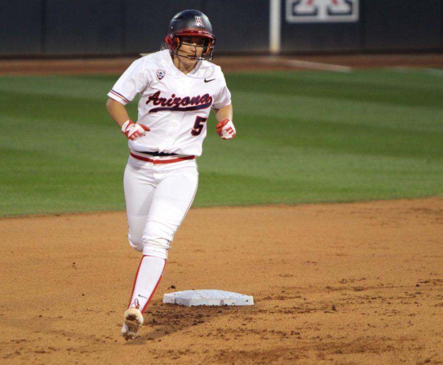 Arizona softball utility player Hallie Wilson (5) rounds second base after hitting a home run during Arizonas 6-1 victory over Drake on Feb. 12 at Hillenbrand Stadium. Wilson has been an integral part of the UA softball team for the past four seasons.