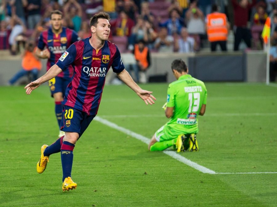 Courtesy of LluisFC Barcelona attacker Lionel Messi celebrating scoring a goal against Granada CF in October 2014. Messi, Luis Suarez and Neymar Jr. have combined for 102 goals this season.