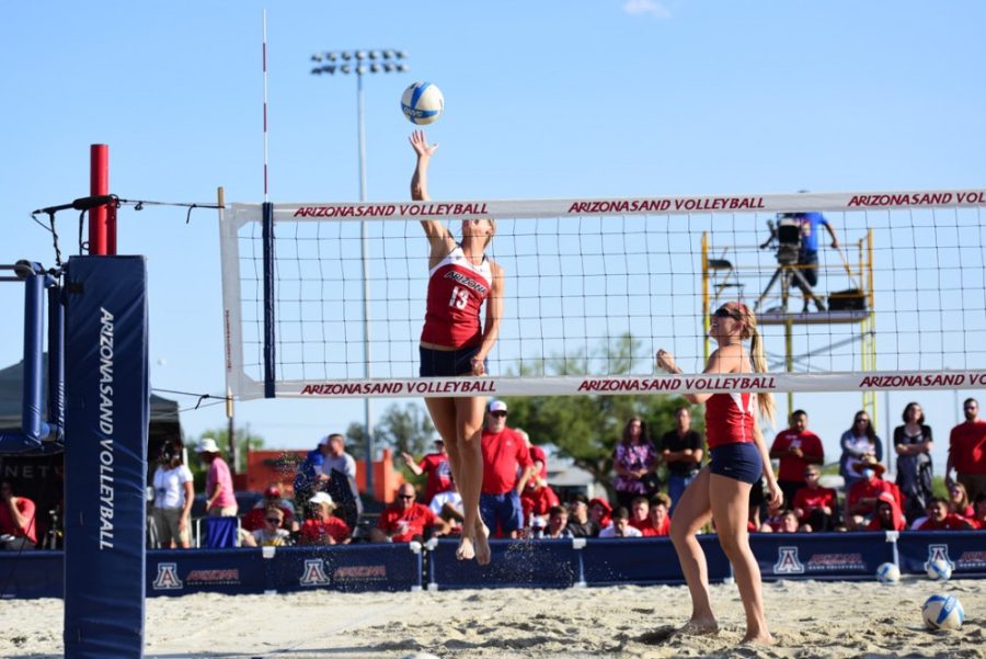 Arizona+sand+volleyball+player+Kaitlyn+Leary+%2813%29+practices+spikes+while+partner+Madi+Kingdon+%2845%29+looks+on+during+Arizonas+4-1+win+against+ASU+at+Jimenez+Field+on+April+22.+Leary+and+the+Wildcats+improved+greatly+as+a+team+from+2014+to+2015.