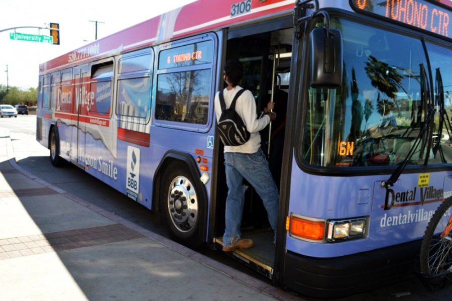 File Photo/Arizona Summer WildcatA Tucson resident boards the northbound Sun Tran at the intersection of University Boulevard and Euclid Avenue on Feb. 13. As of August 6, Sun Tran drivers ansd mechanics have been on strike.