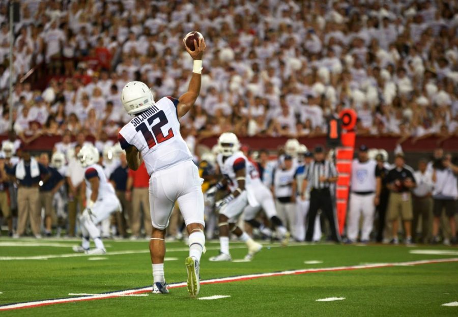 Arizona quarterback Anu Solomon, number 12, throws a pass during a game against Cal on Saturday, September 20, 2014. The Wildcats won with a final score of 49-45.