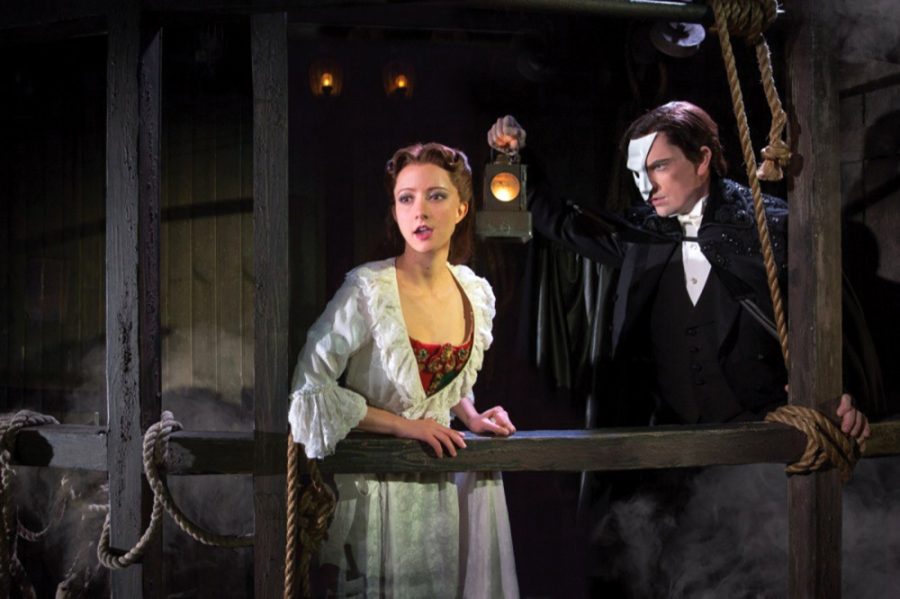 Katie Travis, left, plays Christine Daaé, while Chris Mann plays the role of The Phantom in The Phantom of the Opera.