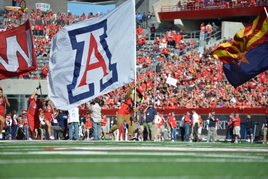Tyler+Baker+%2F+The+Daily+Wildcat%0A%0AWilbur%2C+the+UA+mascot%2C+flies+the+University+of+Arizona+flag+before+the+Territorial+Cup+matchup+against+Arizona+State+University+on+Friday%2C+November+28%2C+2014.+Arizona+would+go+on+to+beat+ASU+and+win+the+Pac-12+South+Championship.