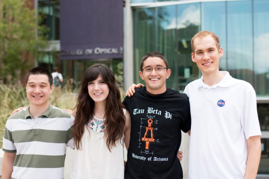 From left to right, Optical Sciences and Engineering seniors Stephanie Guzman, Nick Lyons, Favian Wildenstein, and Travis Sawyer stand in front of the Meinel building Tuesday, August 25, 2015. 