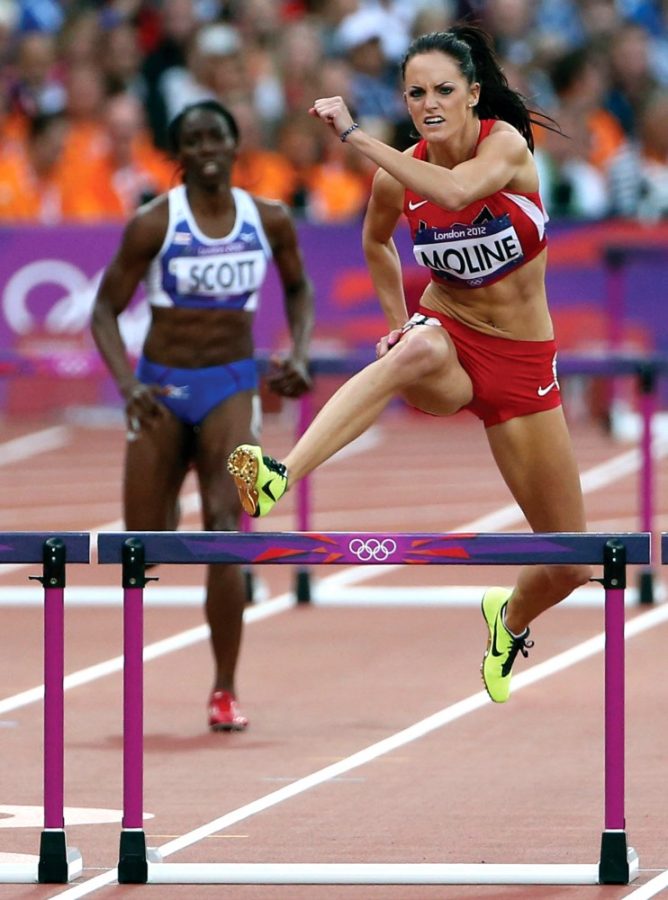 USA's Georganne Moline leads the pack in the women's 400m hurdles semifinal during the Summer Olympic Games on Sunday, August 5, 2012 in London, England. (Vernon Bryant/Dallas Morning News/MCT)