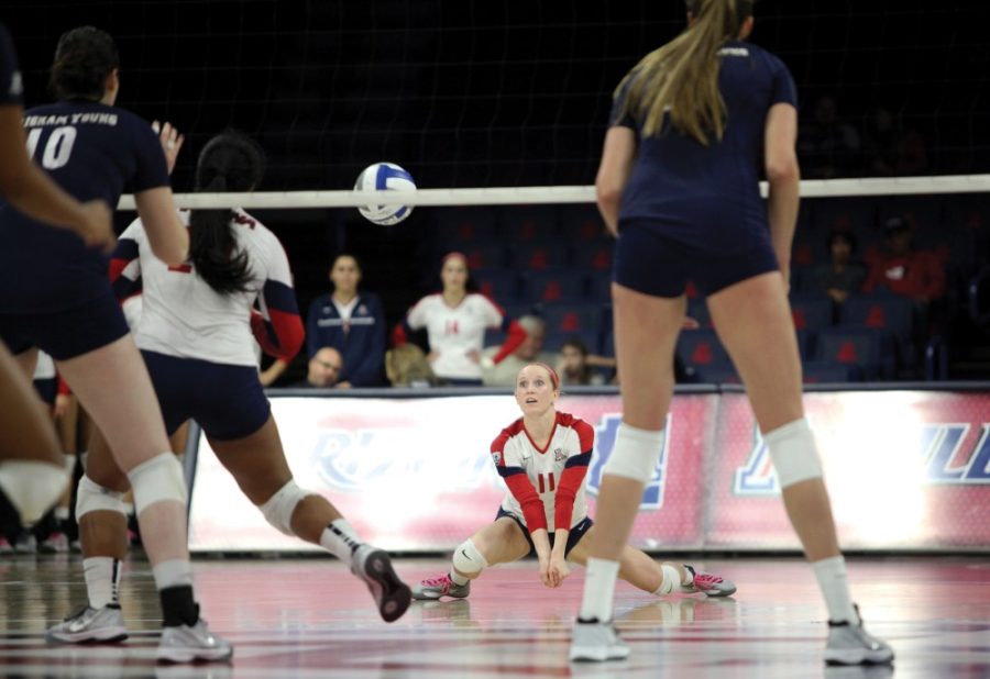 Arizona+volleyball+player+Laura+Larson+dives+for+the+ball+in+a+game+against+BYU+on+Friday%2C+Dec.+5%2C+2014.