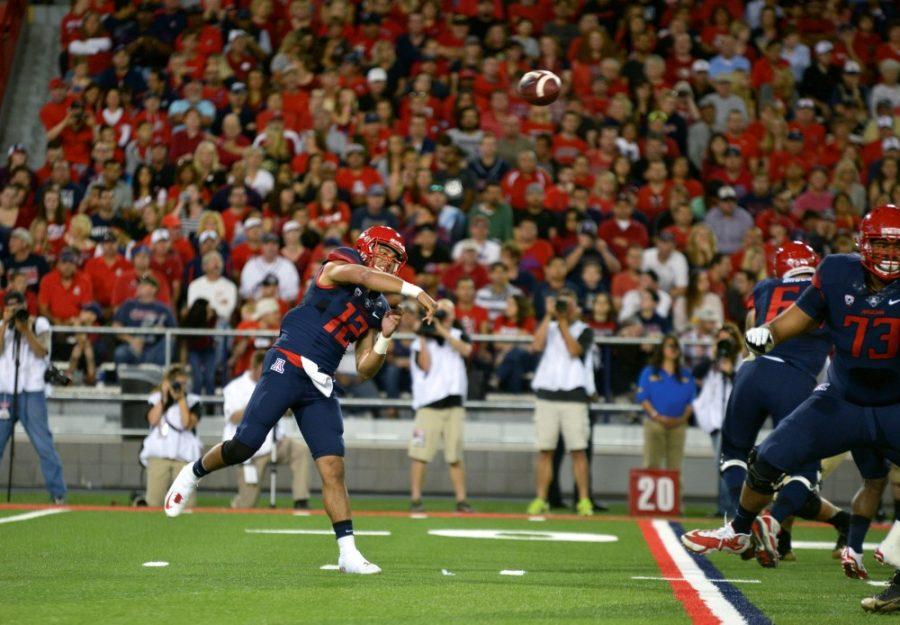 Arizona+quarterbacker+Anu+Solomon+throws+a+pass+while+playing+Colorado+on+Saturday%2C+Nov.+8%2C+2014.+The+Wildcats+dropped+the+game+on+Homecoming+weekend.