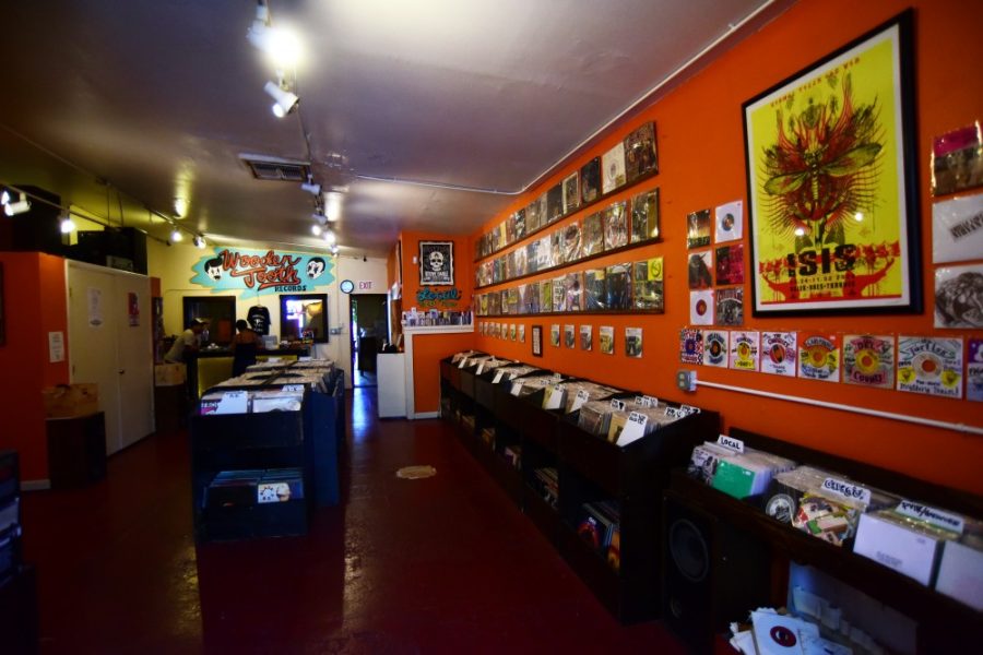 Records on display at Wooden Tooth Records located in the back of Caf