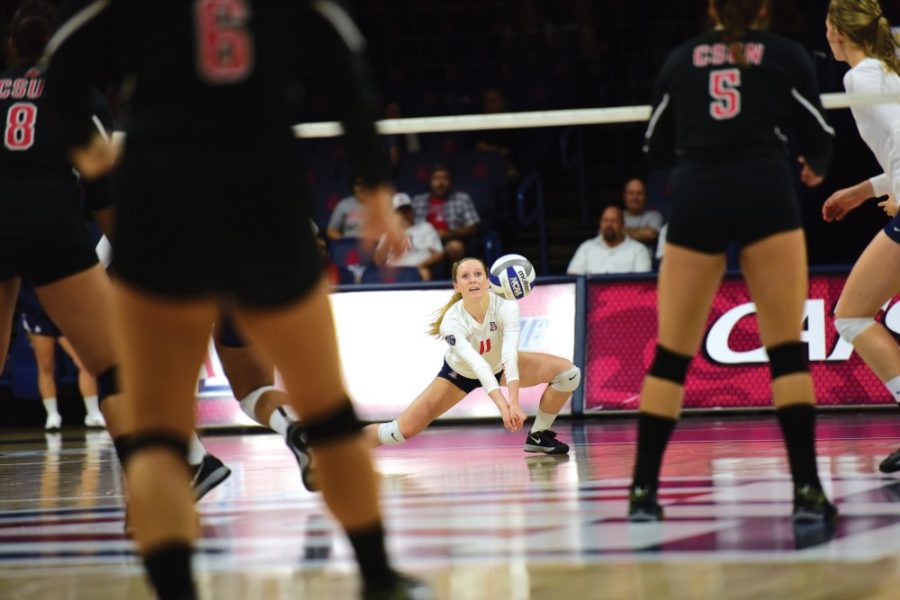 Laura+Larson+%2811%29+dives+to+hit+the+ball+during+a+game+against+Cal+State+Northridge+in+McKale+Center+on+Saturday%2C+Sept.+5.+Larson+has+73+digs+this+year.
