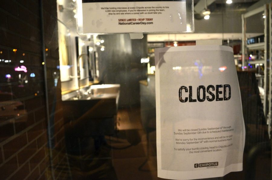 A sign proclaims the news of the week-long closing of the Chipotle on University Boulevard for maintenance on Monday, Sept. 7, 2015.
