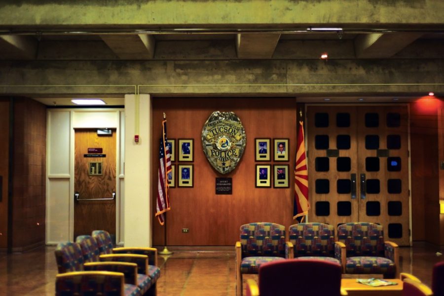 A large­scale Tucson Police Department shield hangs in the lobby of the TPD Main Station, located at 270 S. Stone Ave., on Tuesday, Oct. 27. Eight TPD officers have died protecting the community of Tucson since 1892.