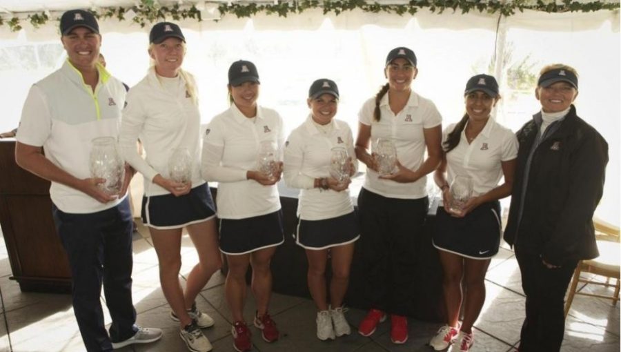 Arizona+womens+golf+poses+with+its+trophies+after+tying+for+the+Windy+City+Classic+title+Tuesday%2C+Oct.+6.+The+UA+finished+12-under+par.