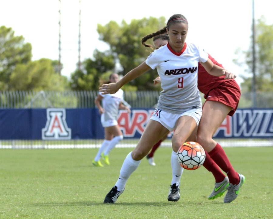 Arizonas+Gabi+Stoian+%289%29+fights+for+the+ball+while+playing+against+Stanford+at+Mulcahy+Soccer+Stadium+on+Sunday%2C+Oct.+4.