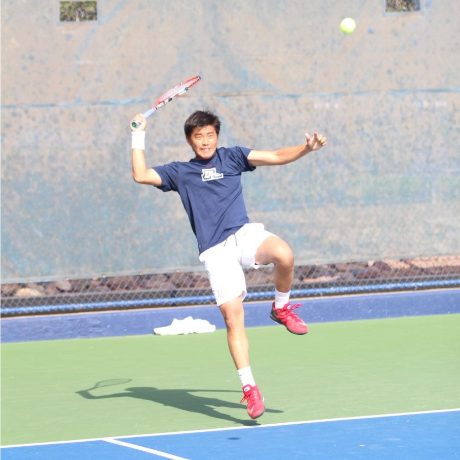 Senior Naoki Takeda returns a ball during a match against a New Mexico State player on Sunday, Feb. 1. He went 22-11 overall last season.