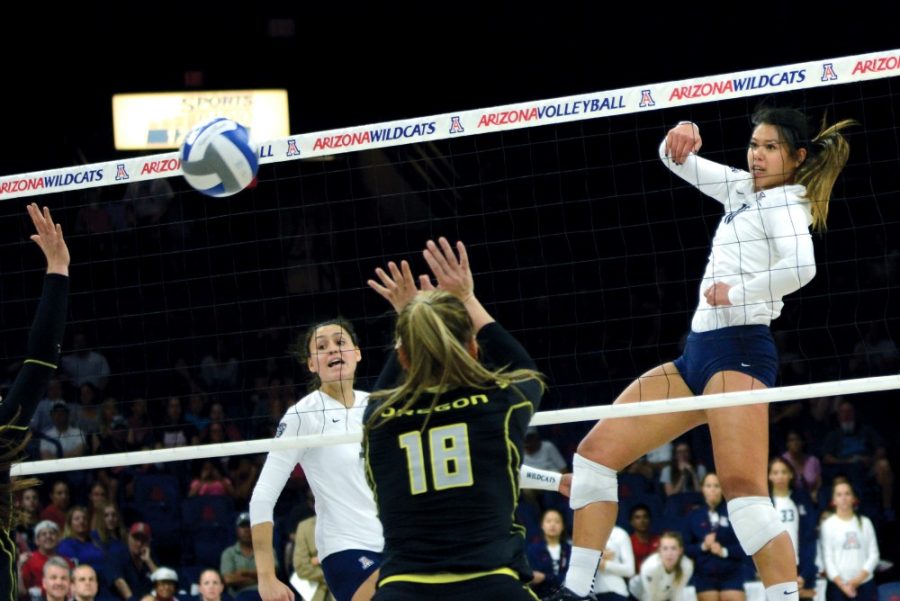 Arizonas Kalei Mau (10) spikes against Oregon in McKale Center during the Wildcats sweep of Oregon on Sunday, Sept. 27. The Wildcats play Washington State this weekend.