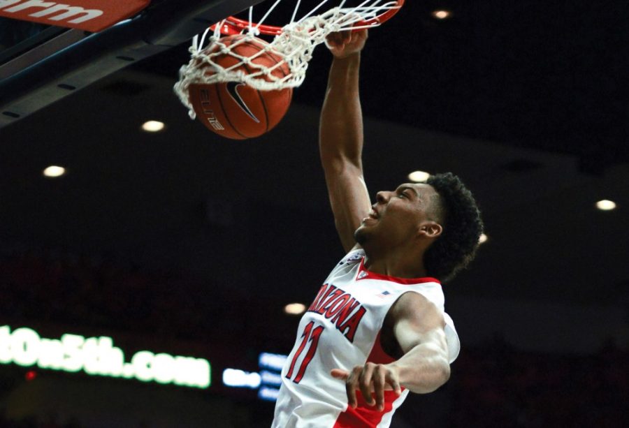 Arizona guard Allonzo Trier (11) dunks against Chico State during the Wildcats exhibition game in McKale Center on Nov. 8. The five-star recruit came off the bench and tallied 13 points and six rebounds in 25 minutes. 