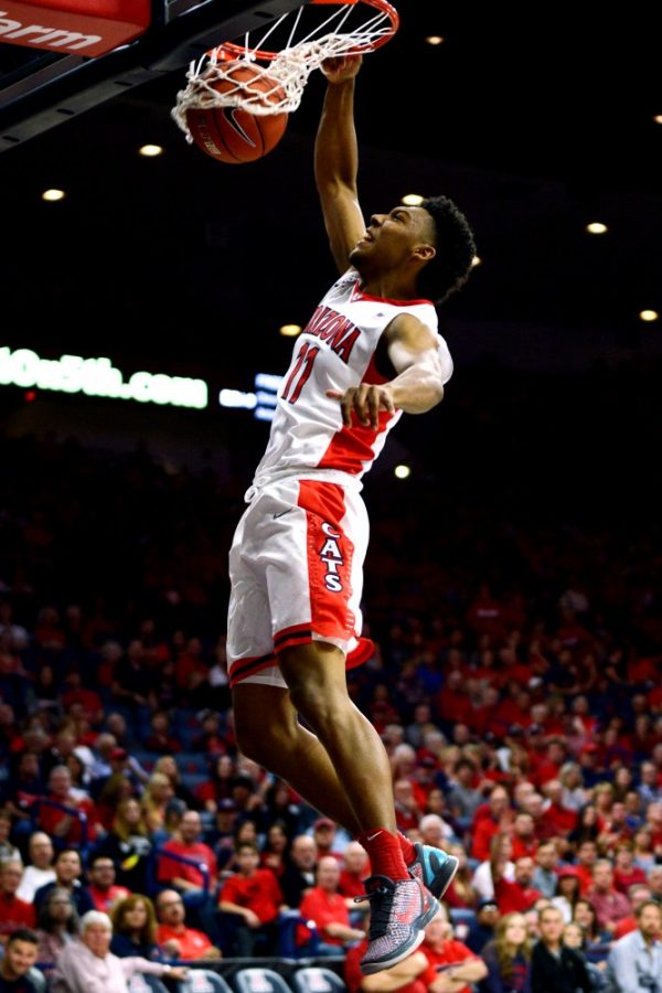 Arizona guard Allonzo Trier (11) finishes a ferocious dunk in McKale Center during the Wildcats exhibition against Chico State on Nov. 8. Trier finished with 22 points and went 14-for-14 from the line against Bradley after shooting 1-for-10 from the field on opening night.