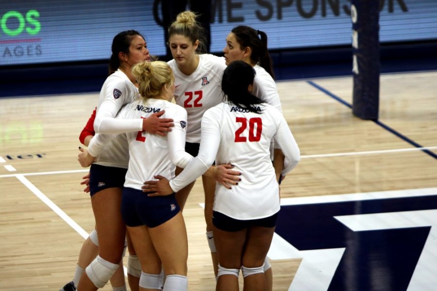 Arizona volleyball players regroup during downtime to celebrate and plan their next play in McKale Center on Sunday, Nov. 22. Arizona upset No. 11 UCLA in five sets.