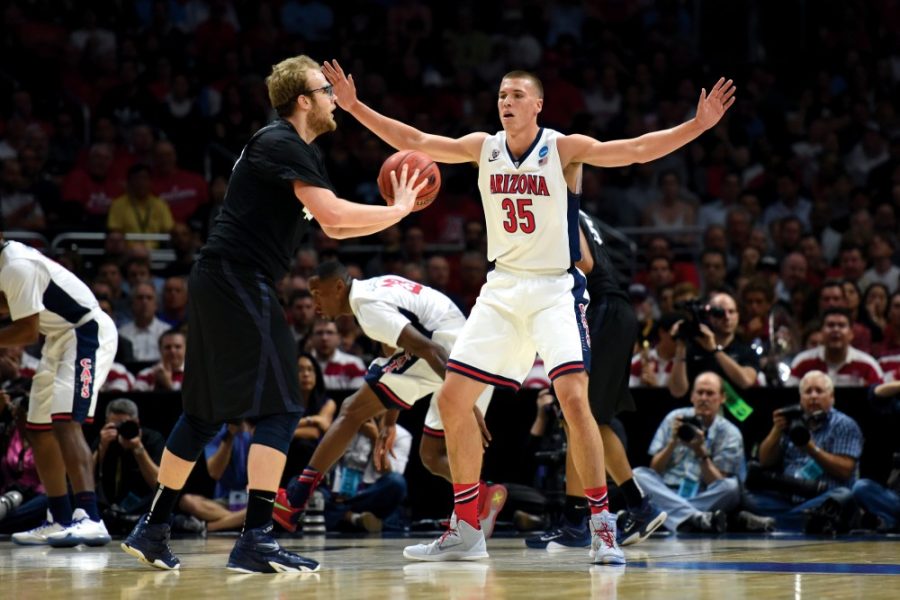 Arizona center Kaleb Tarczewski (35) does his best imitation of a wall for the Xavier offense during the NCAA Tournament on March 26. Tarczewski has a chance to become the winningest all-time player in Arizona basketball history.