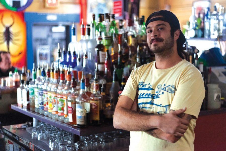 Jeronimo Madril, a bartender at Che’s Lounge, poses for a photo while talking about his bartending experience. The lounge is located at 350 N. Fourth Ave. Madril said he enjoys making watermelon margaritas.