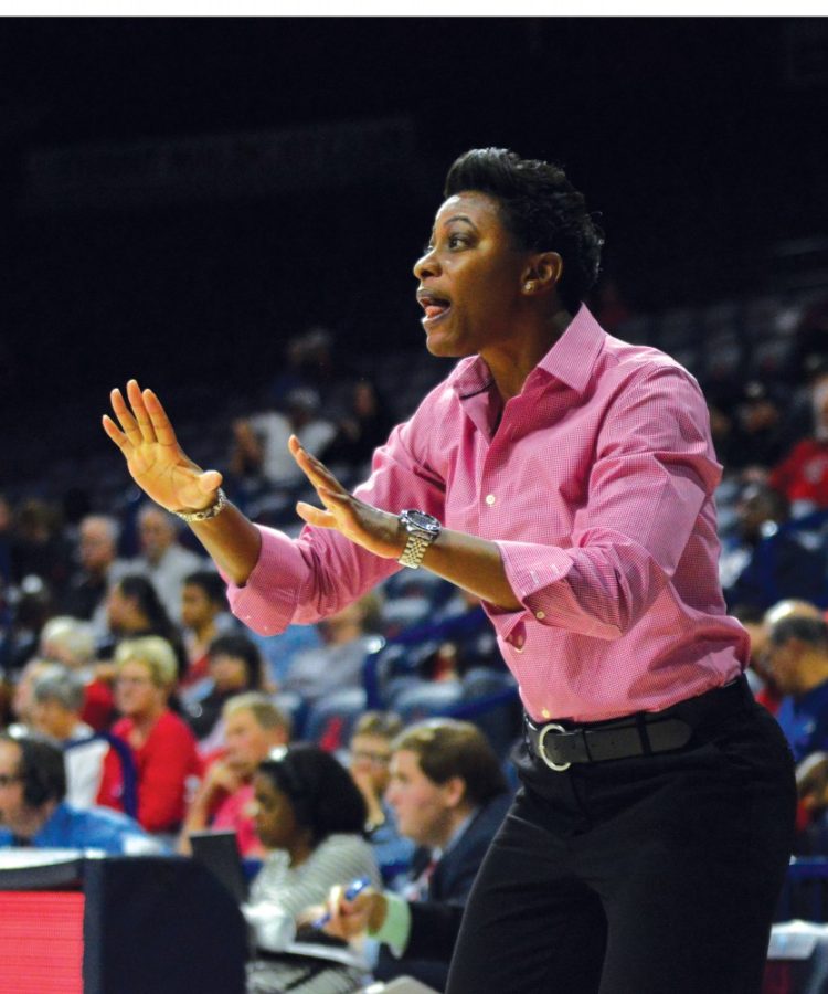 Arizona head coach Niya Butts tries to fire up her players while playing Eastern New Mexico in McKale Center on Nov. 10.