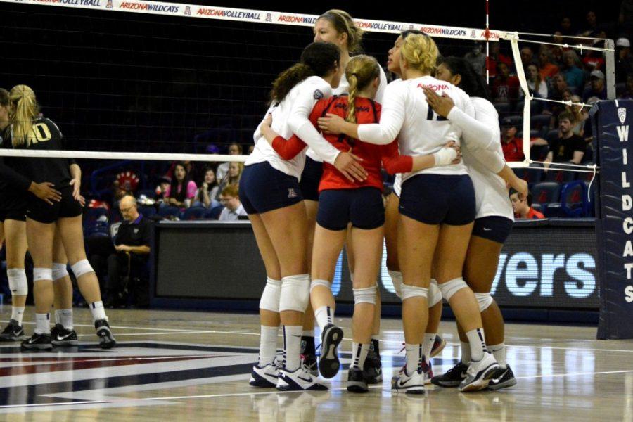 The Arizona volleyball team huddles together in McKale Center against Washington on Sunday, Nov. 8. The Huskies swept the Wildcats 3-0 for the second time this season at the NCAA tournament regional semi-final.