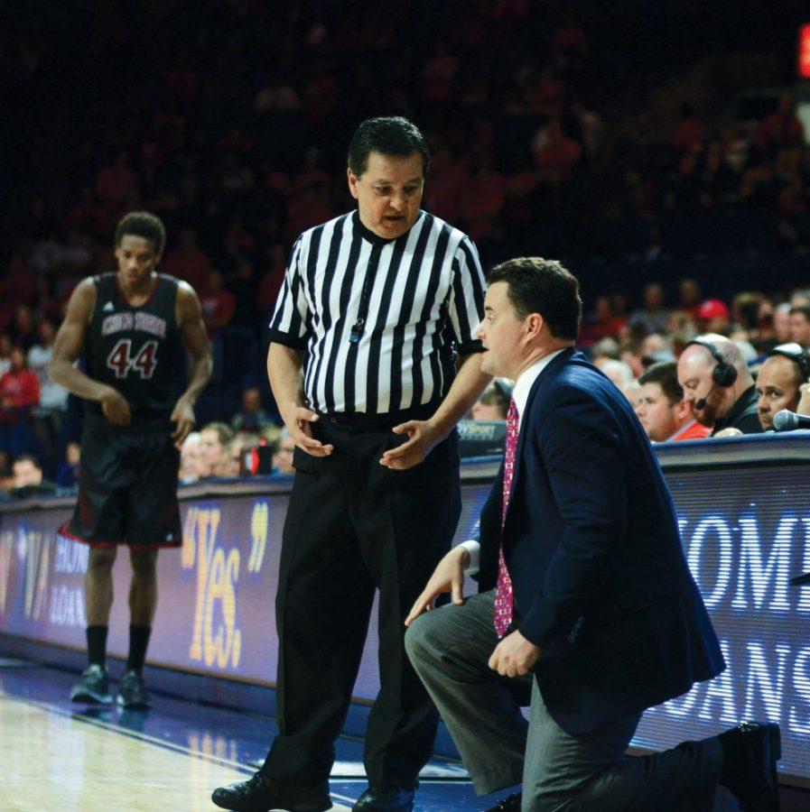 A referee speaks with Arizona head coach Sean Miller on Nov. 8 in McKale Center during the Wildcats exhibition game against Chico State. Arizona played with the newly adjusted shot clock for the first time in its 90-54 exhibition victory.