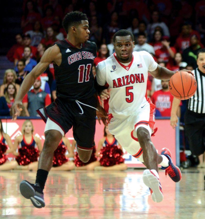 <p>Arizona guard Kadeem Allen (5) dribbles while closely defended by Chico State point guard Jalen McFerren (11) in McKale Center on Nov. 8. Allen started at point guard and finished with five points and four assists in 15 minutes.</p>