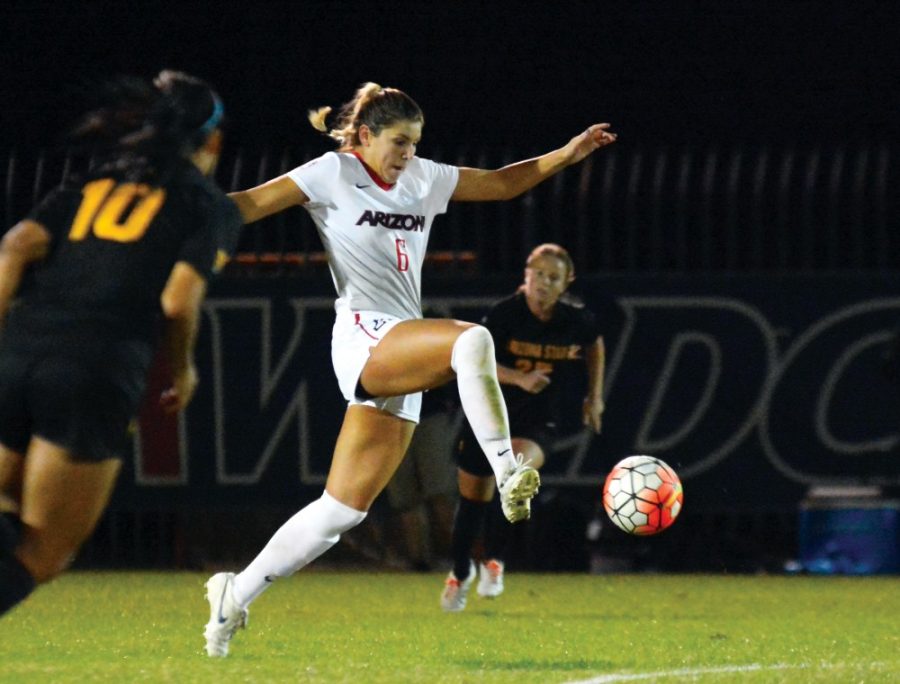 <p>Arizona defender Sheaffer Skadsen (6) drives the ball down the field while playing against ASU at Murphey Field at Mulcahy Soccer Stadium on Nov. 6. Skadsen, a senior, hopes to keep her collegiate career alive with a postseason victory Friday. </p>