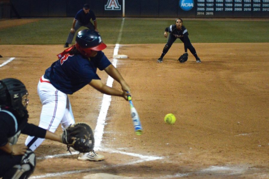 Arizona outfielder Katiyana Mauga (34) connects with the ball while playing Pima at Hillenbrand Stadium on Sunday, Nov. 1. Mauga blasted three home runs during the weekends Arizona Invitational, bringing her season total to six.