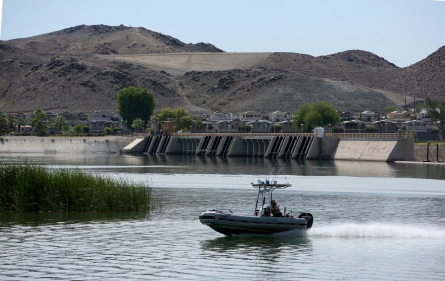 A homeland security patrol boat patrols the Colorado River at Imperial Dam on May 27, 2015 near Yuma, Ariz.
