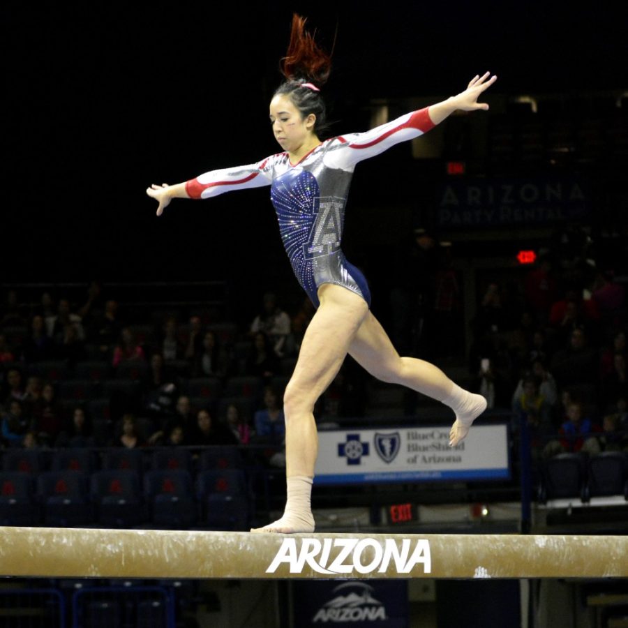 Arizona gymnast Shelby Edwards on the balance beam in McKale Center on Friday, Jan. 8. Arizona defeated Michigan State and moved up to No. 10 in the national rankings.