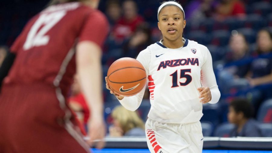 Arizona guard Keyahndra Cannon (15), the only senior on the womens basketball team this season, brings the ball downcourt in McKale Center on Sunday, Feb. 21. The Wildcats dropped a heartbreaker at home, their final game in McKale Center for the season. 