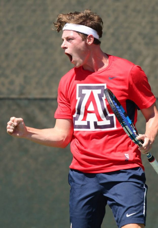 Arizona mens tennis junior Harry Busby celebrates a victory in Tucson during the Wildcat Invitational on Sept. 25, 2015. Busby transferred from Mesa Community College and was ranked as one of the top junior college players in the country.