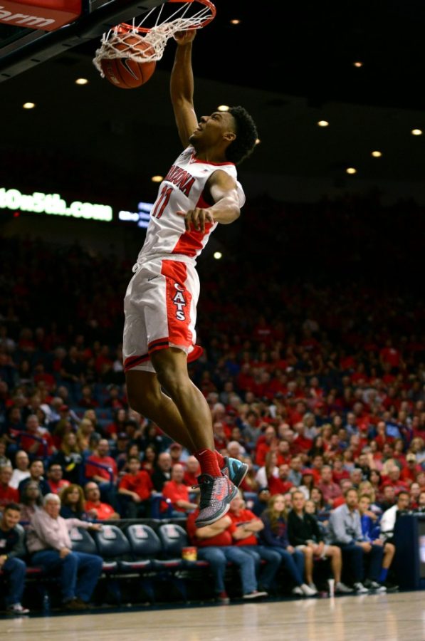 Arizona guard Allonzo Trier (11) dunks in McKale Center on Nov. 8, 2015. With Triers return comes another explosive offensive threat to the lineup and defensive tenacity to keep playing hard. 