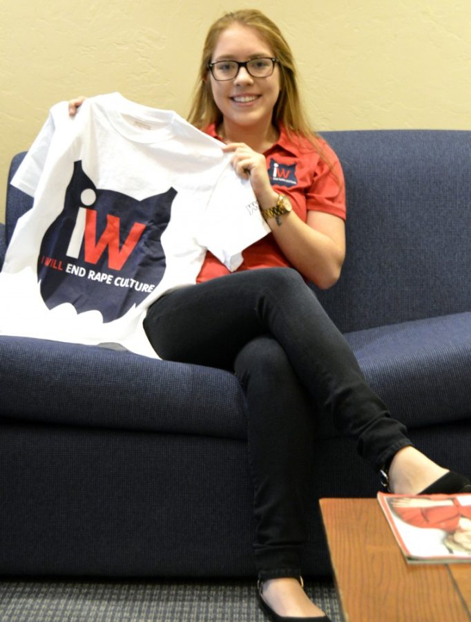 Tatum Hammond, ASUA administrative vice president and co-director of the I Will End Rape Culture campaign, poses with a T-shirt to promote I Will in the ASUA office on Wednesday, Jan 27. The new campaign is working to end rape culture and promote sexual assault awareness on campus.