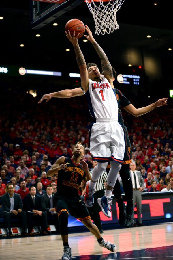 Arizona+guard+Gabe+York+%281%29+leaps+up+to+dunk+in+McKale+Center+on+Sunday%2C+Feb.+14.+The+Wildcats+won+86-80.