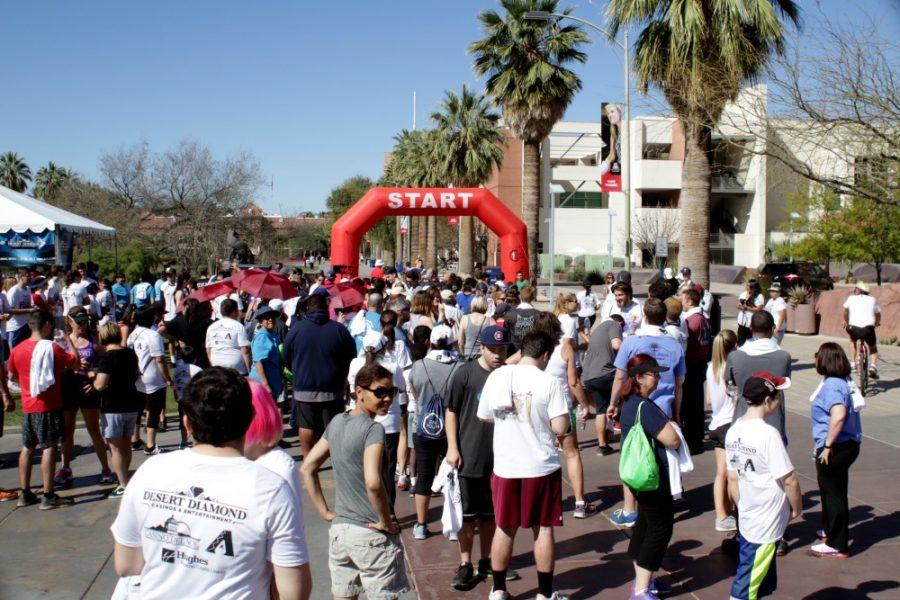 Runners prepare to start the Lute Olson Cancer Center Run along the UA Mall on Sunday, Feb. 28. The UA Pi Kappa Alpha fraternity sponsored event has been raising money to help cancer research since 2001.