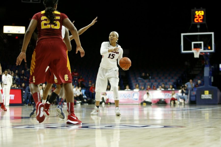 Arizona guard Keyahndra Cannon (15) signals to her teammate during a game against USC on Feb 5. Senior Cannon will compete in her last two regular season ames as a Wildcat this weekend.