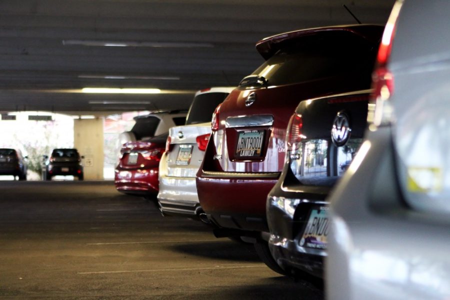 Cars parked in a line in Tyndall garage on March 23. Students are divided into two groups: those with cars and those without.