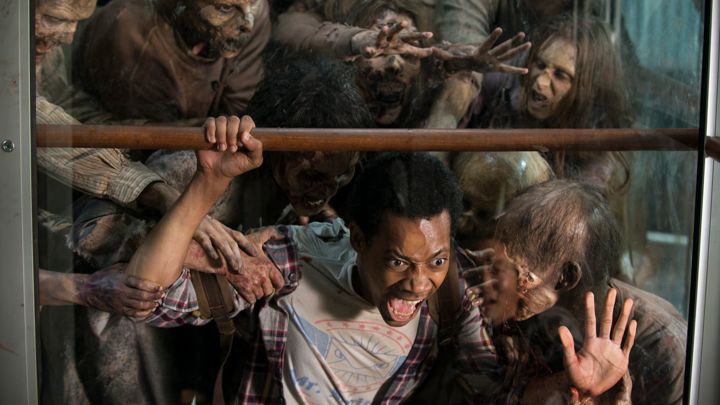 Tyler James Williams gets attacked by walkers in season five of The Walking Dead. The AMC show premieres Sunday nights. 