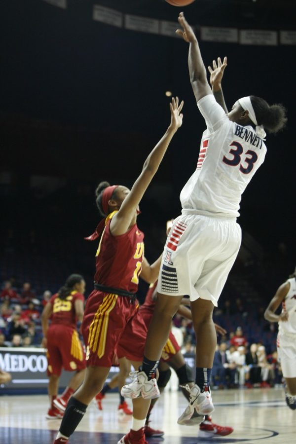 Arizona+guard+JaLea+Bennett+%2833%29+jumps+back+while+shooting+over+a+USC+athlete+in+McKale+Center+on+Friday%2C+Feb.+5.