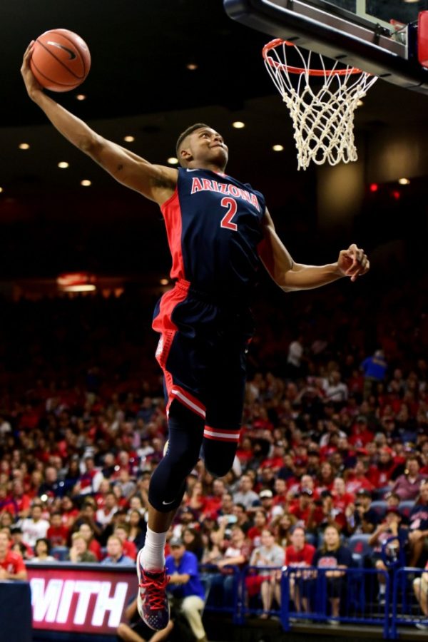 Arizona forward Ray Smith (2) dunks the ball during Arizona’s Red-Blue scrimmage on Oct 17 in McKale Center. The freshman missed the season due to a right knee injury.