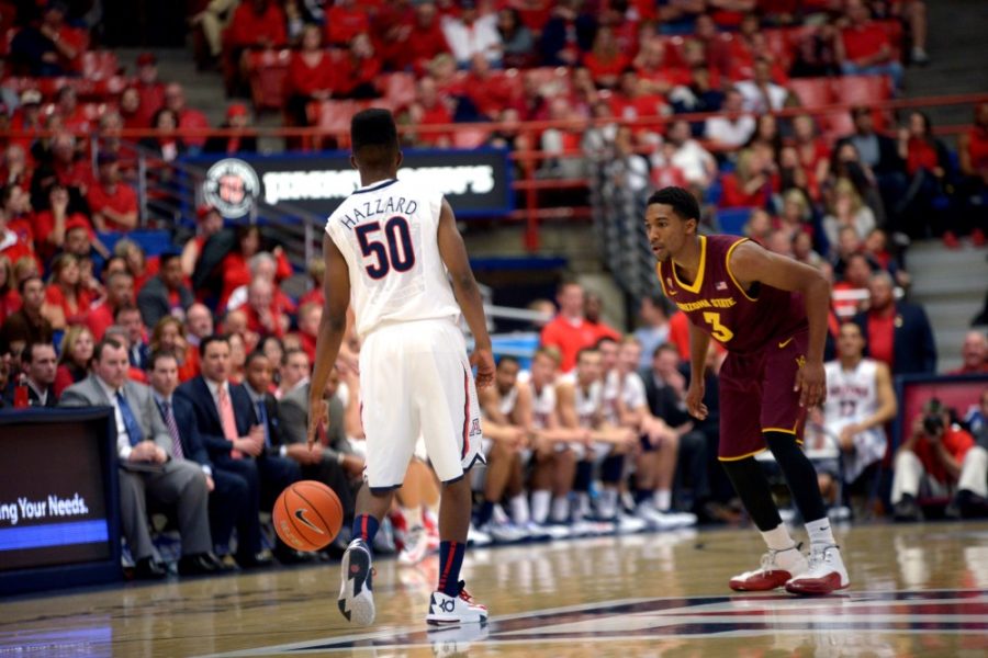 Arizona guard Jacob Hazzard (50) brings the ball down court at the end of the game against ASU in McKale Center on Jan 23, 2014.