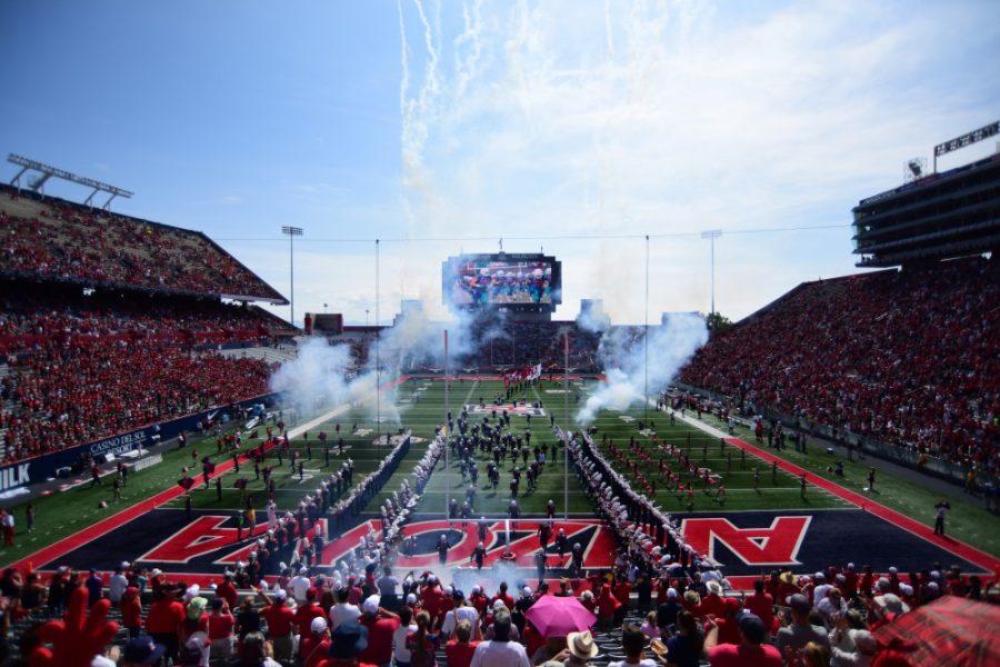 Arizona football runs out to the marching band and fireworks at the beginning of the Wildcats game against OSU on Oct. 10, 2015. This Saturday, Sept. 29 will be UA Athletics Hispanic Heritage Night, featuring local music and DJs and food from Tucson-Mexican food favorite El Charro Cafe.
