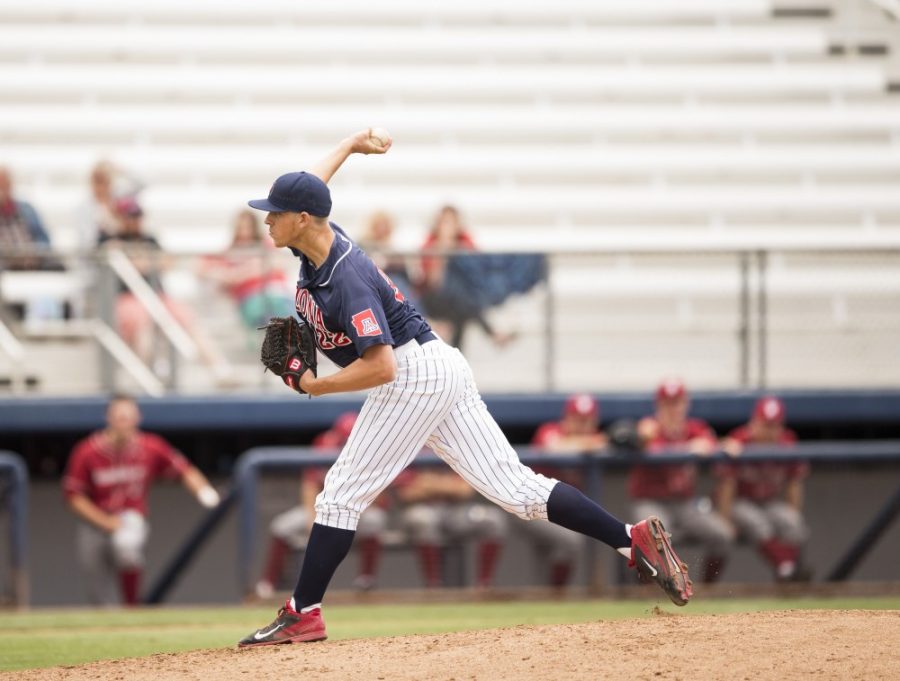 Arizona pitcher Kevin Ginkel (22) throws a pitch against Washington State at Hi Corbett Field on Sunday, April 10. The Wildcats host Stanford for a three-game series beginning Friday.