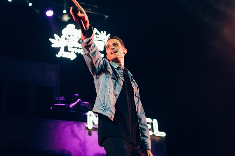 Rapper G-Eazy points off stage, pushing the crowd to scream lowder as he performs Order More, off his most recent album When Its Dark Out.