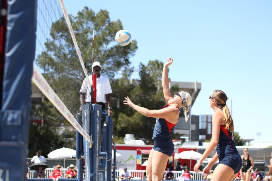 Arizona sand volleyball athletes return the volley in Tucson, playing against CSU on Friday, March 26. The sand volleyball team hosts rival ASU on Thursday afternoon.