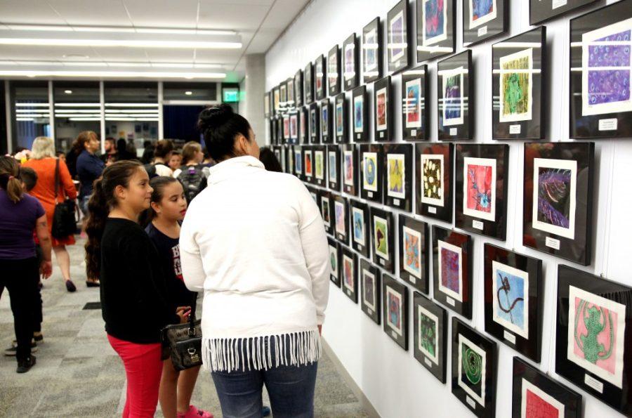 Students from Manzo Elementary School and Mansfield Middle School who are working with Biosphere 2s Landscape Evolution Observatory attend the opening night of their art display in ENR2 on Friday, April 8. The goal of this project was to give K-12 students access to hands-on science activities.